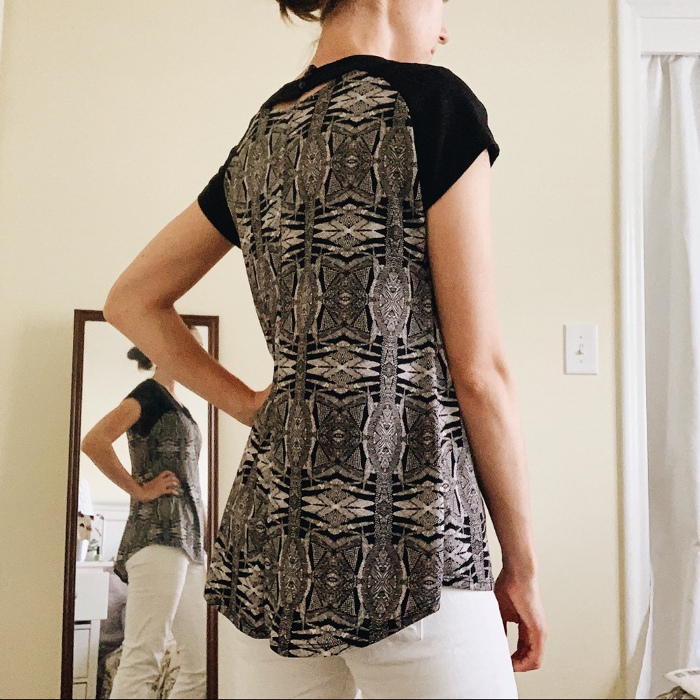 Black and white patterned blouse with back cut-out